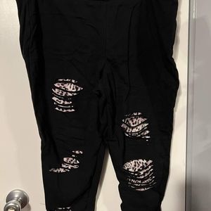 Ripped leopard print black leggings